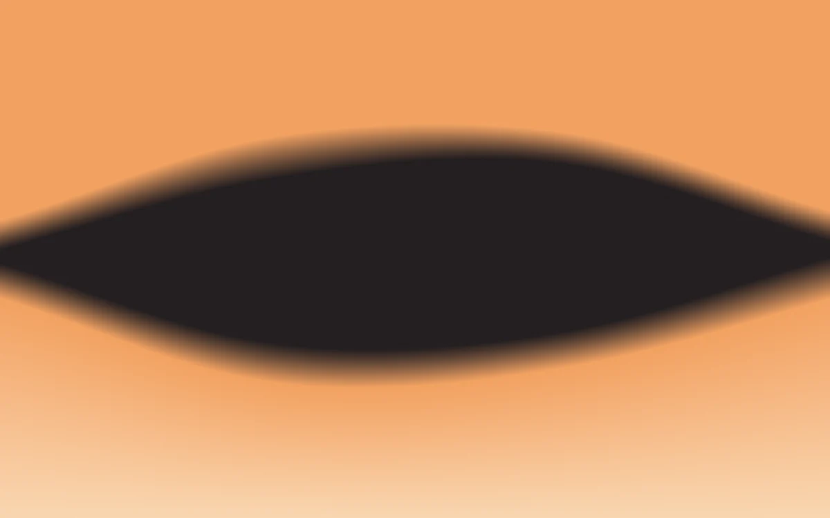 Kiln: A dark almond of shadow held in warm light.